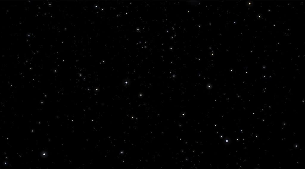 Dreamy star-filled sky over lake